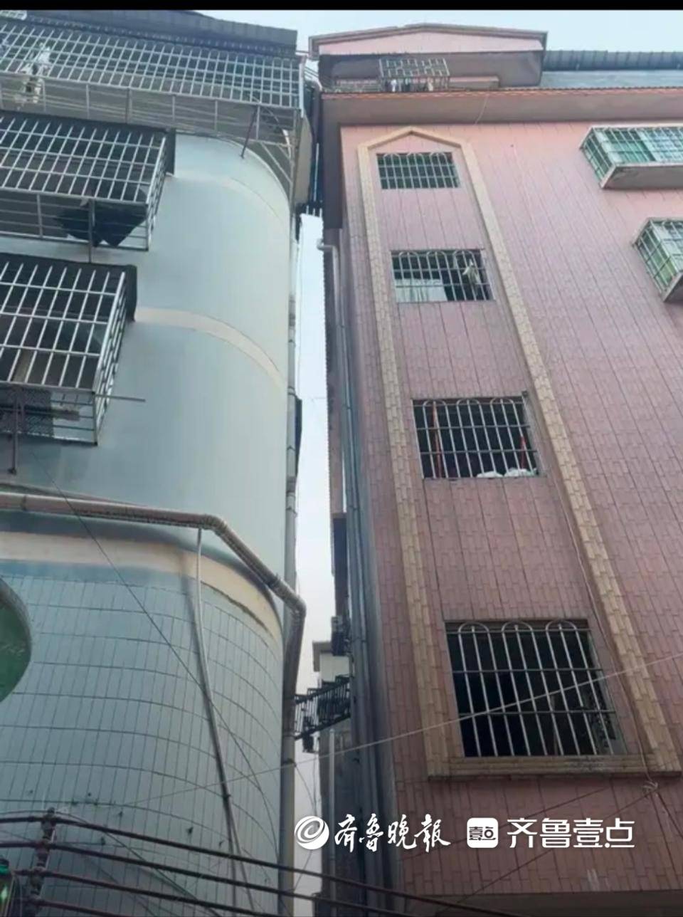 廣州震后出現(xiàn)樓體傾斜，與旁邊樓貼在一起，居委會：正在安全檢測